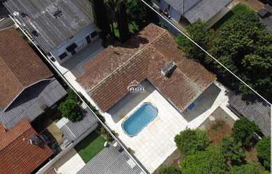 Imagem 5: Ampla casa com 03 quartos, salão de festas, piscina e 930m² de terreno no Centro de Getúli