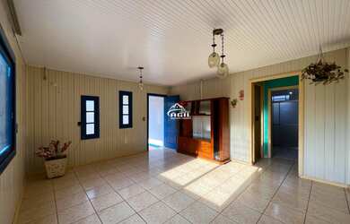 Imagem 5: Casa ampla em madeira, no Centro de Getúlio Vargas!