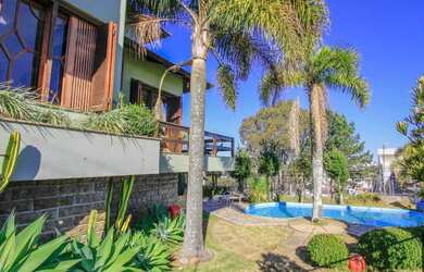 Imagem 4: Casa com 4 Dormitorio(s) localizado(a) no bairro Santa Catarina em Caxias do Sul / RIO GR