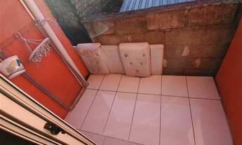 Imagem 7: Sobrado bairro Parque Oásis, rua principal