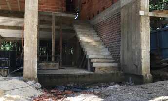 Imagem: Lote com casa em construção à venda no