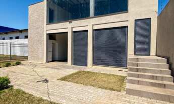 Imagem: Prédio comercial e terreno de esquina