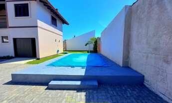 Imagem 6: Lindo sobrado, com seis dormitórios, piscina, dois terrenos, no centro de Imbé. R$-1.150.0