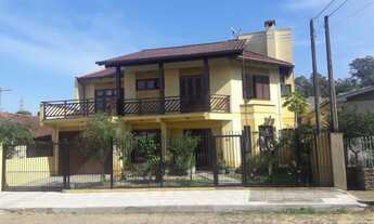 Imagem: Casa com 4 Dormitorio(s) localizado(a) no