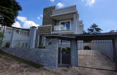 Imagem 2: Casa três dormitórios sendo duas suítes