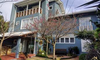 Imagem: Casa com três dormitórios sendo uma suíte