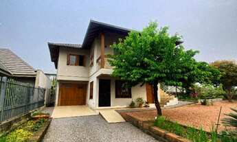 Imagem: Casa com três dormitórios, sendo uma suíte