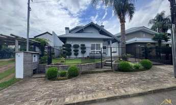 Imagem: Casa com três dormitórios sendo duas suites