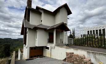 Imagem 2: Casa com três dormitórios ,sendo um deles suíte, no bairro Pousada da Neve, Nova Petrópoli