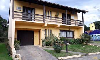 Imagem: Casa com quatro dormitórios. Bairro Logradouro