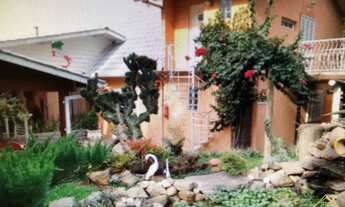 Imagem 2: Propriedade com Boutique Hotel Imersa em Jardim