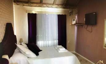 Imagem 4: Propriedade com Boutique Hotel Imersa em Jardim