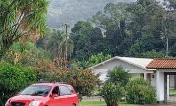 Imagem 3: Espetacular casa com três dormitórios, incluindo duas suítes, situada no coração do Bairro