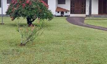 Imagem 5: Espetacular casa com três dormitórios, incluindo duas suítes, situada no coração do Bairro