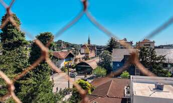 Imagem 2: Apartamento com vista para a Rua Coberta