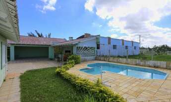 Imagem 2: CASA EM TORRES, MOBILIADA, NA PRAIA PARAISO, DOIS TERRENOS COM PISCINA