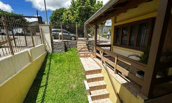 Imagem 5: Casa à venda em Farroupilha, bairro Primeiro de Maio, com 3 dormitórios e churrasqueira