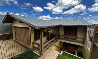 Imagem 3: Casa à venda em Farroupilha, bairro Primeiro de Maio, com 3 dormitórios e churrasqueira