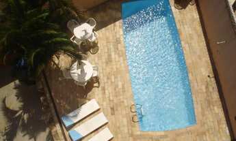 Imagem 2: Tríplex Casa com 4 dormitórios