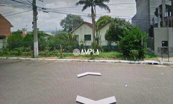 Imagem: CASA COM DOIS TERRENOS NO BAIRRO IDEAL