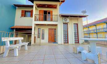 Imagem 2: Sobrado de 3 dormitórios com suíte e duas lojas