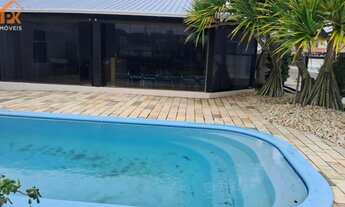 Imagem: Casa à venda em Atlântida Sul, piscina