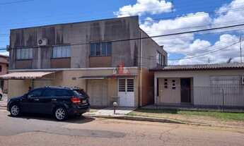 Imagem 2: Casa Alvenaria e prédio residencial e comercial