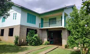 Imagem: Área de terra com casa