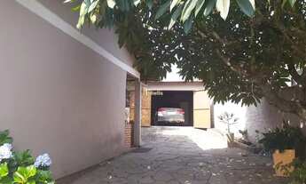 Imagem 2: Casa com 5 dormitórios na Lomba da Tarumã-Aceita financiamento bancário e FGTS