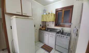 Imagem 6: Amplo apartamento de 1 dormitório - Centro de Capão da Canoa - sacada com churrasqueira