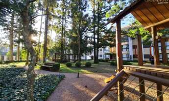 Imagem: Apartamento com sala de TV e cozinha americana