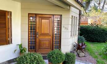 Imagem: Casa totalmente plana, com piscina no Centro