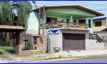 Imagem 2: Casa com 120 metros quadrados, sacada, terraço, 3 quartos sendo 1 suíte, 3 banheiros, 3 va