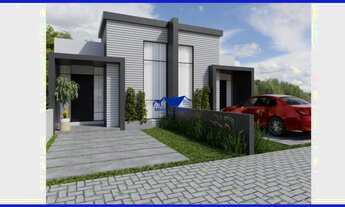 Imagem 2: Casa com 72,65 metros quadrados de área construída, pé direito alto, sala de estar, jantar