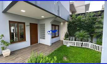 Imagem 2: Lindo sobrado com 105m² com três dormitórios, salas de estar e jantar integradas com a coz