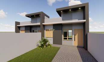 Imagem: Casa com área de serviço, varanda e jardim