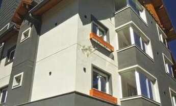 Imagem 2: Invista em Gramado: Apartamento com Suíte e Churrasqueira no Bairro Moura, próximo ao Cent