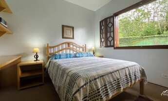 Imagem 4: Viva em uma casa iluminada pelo sol com terreno aproveitável