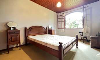 Imagem 5: Casa rústica com área gourmet e salão de jogos