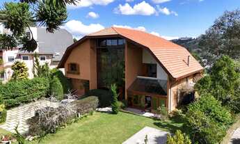 Imagem: Casa com 5 suítes à venda e vista deslumbrante!