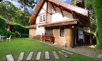 Imagem: Casa com terreno plano, local arborizado