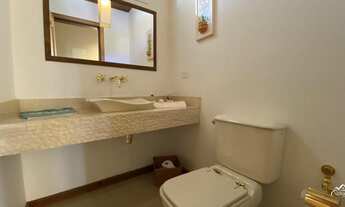 Imagem 5: Viva o Luxo em Sintonia com a Natureza: Casa Mobiliada com 4 Suítes em Condomínio Exclusiv