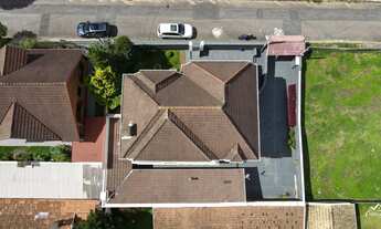 Imagem 5: Refúgio Familiar: Sua Casa dos Sonhos em um Bairro Tranquilo!