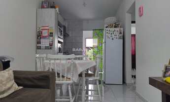 Imagem 2: Casa à Venda no bairro Universitário, em Tijucas/SC. Conta com dois dormitórios, sala e co