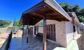 Imagem 2: Casa no Bairro Monte Pasqual, com 3 dormitórios e 2 vagas de garagem