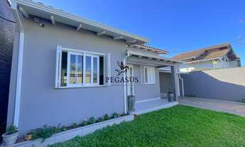 Imagem 2: Casa térrea semimobiliada no bairro Vicentina em São Leopoldo. Pátio amplo, painéis fotovo