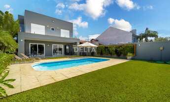 Imagem 3: Casa moderna e impecável à venda no bairro Boa Vista em Novo Hamburgo, com 3 suítes, ambi