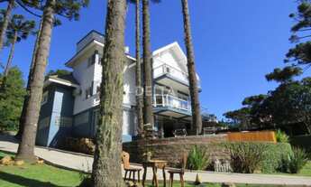 Imagem 2: Excelente residência semimobiliada com 310 m² de área construída, terreno 995,50 m² locali