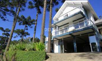 Imagem 3: Excelente residência semimobiliada com 310 m² de área construída, terreno 995,50 m² locali