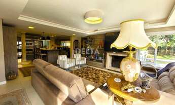 Imagem 4: Excelente residência semimobiliada com 310 m² de área construída, terreno 995,50 m² locali